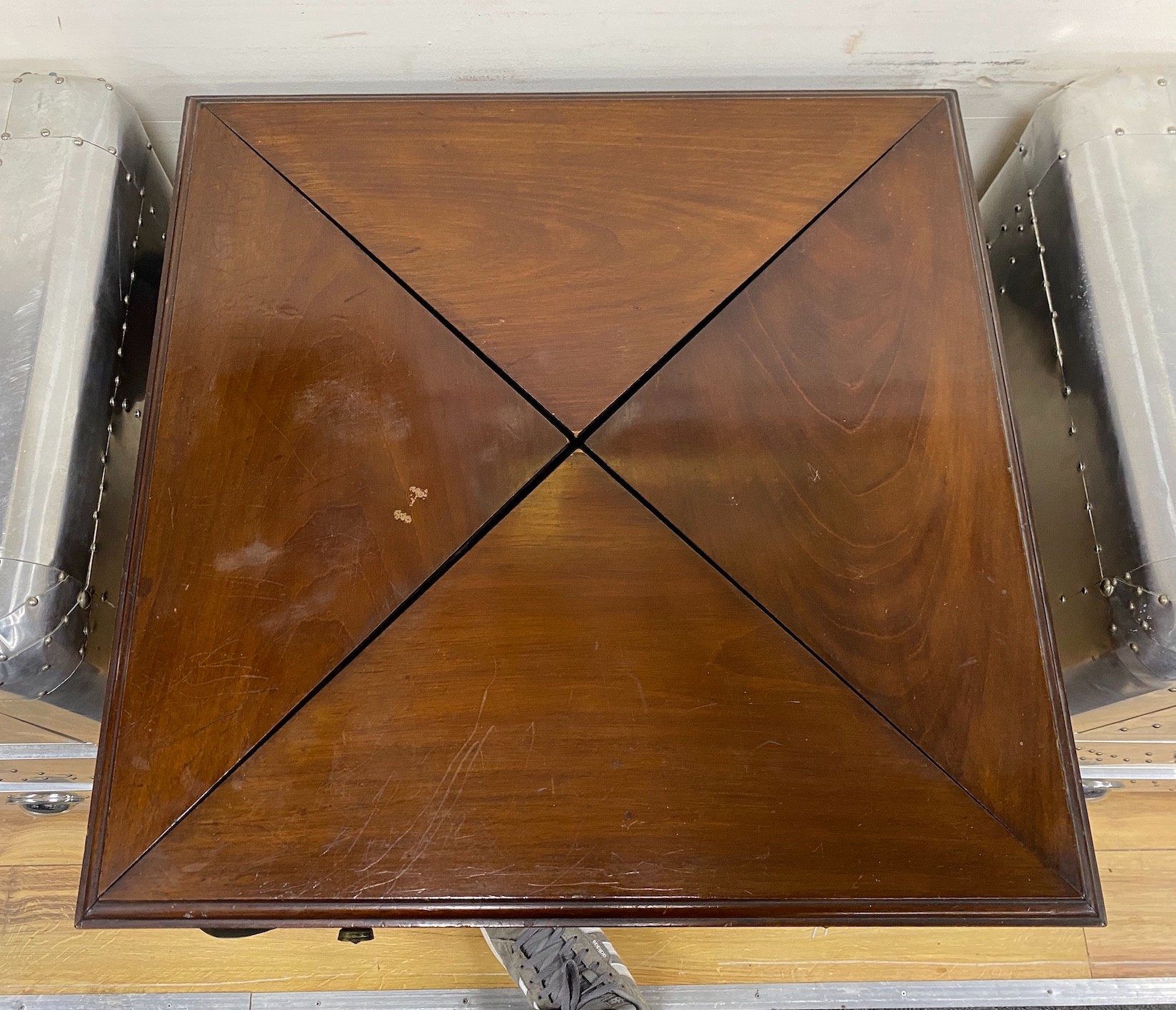 An Edwardian mahogany envelope card table, width 51cm